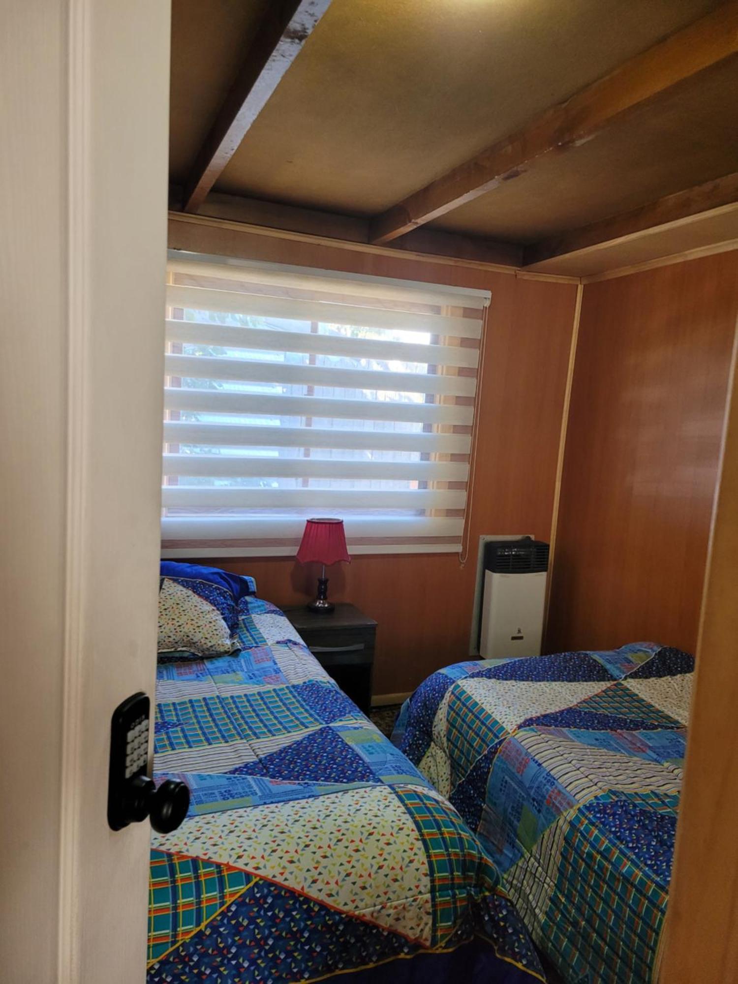 Hostal Traveltour El Campesino プエルト・ナタレス エクステリア 写真